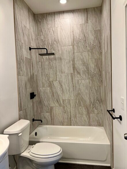 tile shower - 110 W 3rd St