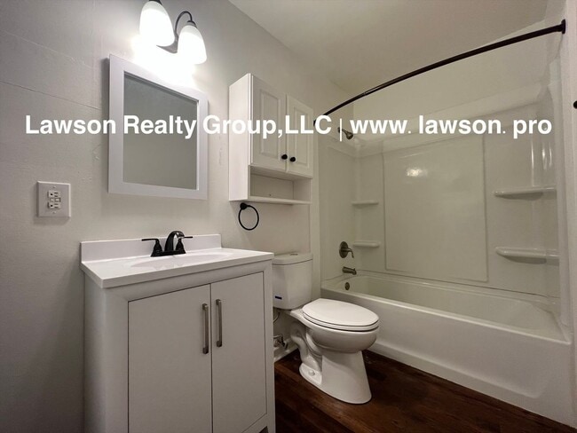 Building Photo - Adorable and Updated-One Level Living with Paved Driveway