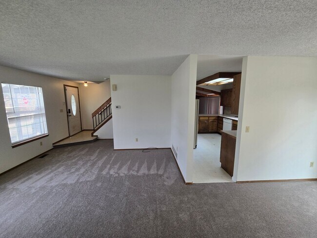 Building Photo - 3409 E 99th Dr