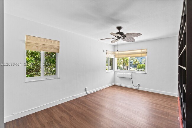 Building Photo - 10190 Collins Ave