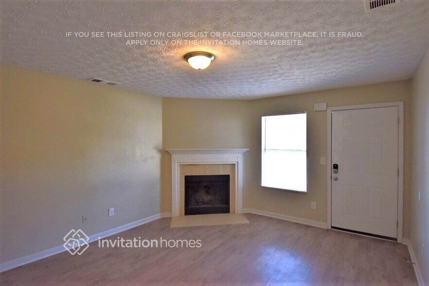 Building Photo - 727 Trickle Ln