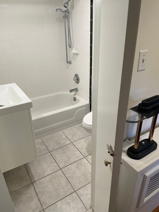Bedroom 2 newly renovated bath with tub - 1869 Park Rd NW