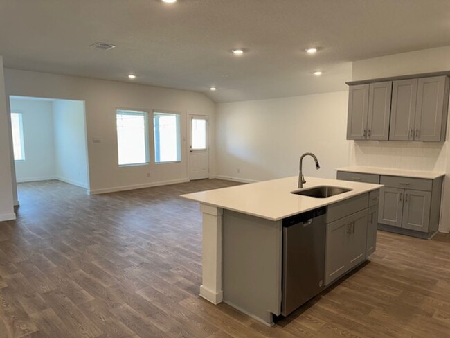 Building Photo - BRAND NEW 4 BR / 2 BA with THREE-CAR GARAG...