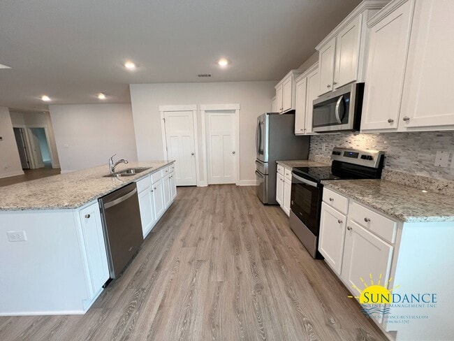 Building Photo - 4-Bedroom SOLAR ENERGY Home in Shoal River Landing!