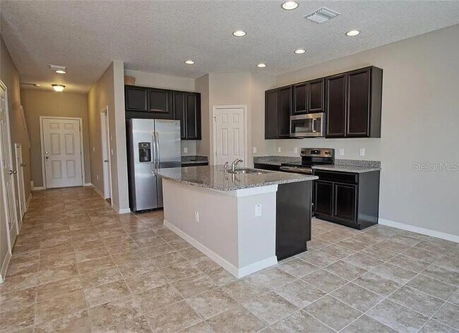 Building Photo - 7026 Woodchase Glen Dr