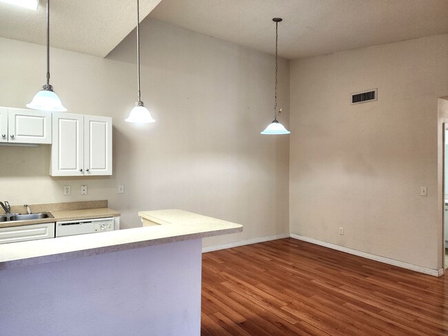 Building Photo - Second Floor Condo Unit; Open Floor Plan; ...