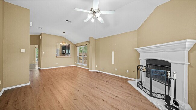 Building Photo - Move-In Ready Montgomery Home with Fenced Yard & Mature Trees!