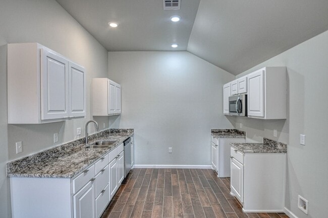 Building Photo - New Construction in Varenna Landing! Storm shelter and lawn care included!