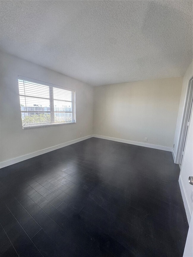 Building Photo - 8750 N Sherman Cir