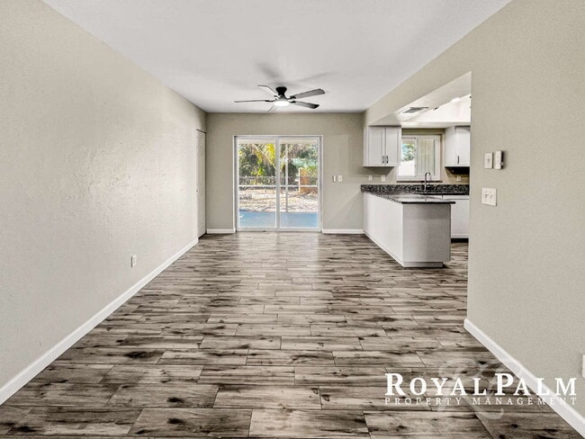 Building Photo - Tree-Lined 2BR/1BA Fort Myers Duplex with Fenced Yard, Storage Shed & In-Unit Laundry!