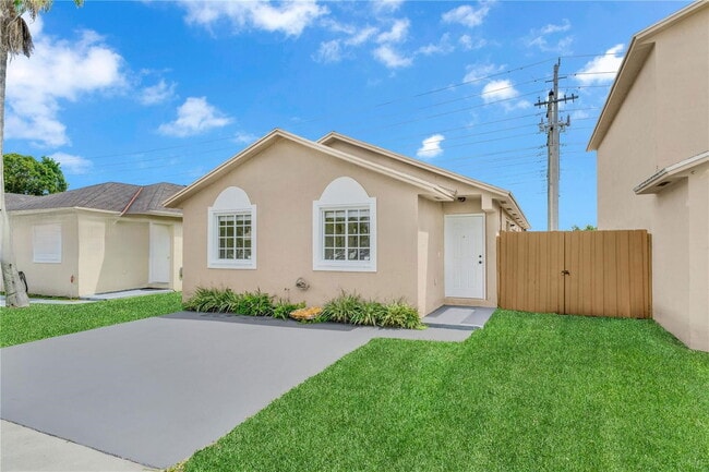 Building Photo - 16215 SW 137th Ct