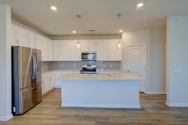 Building Photo - Spacious 4BR Rental with Stunning Kitchen & Covered Patio