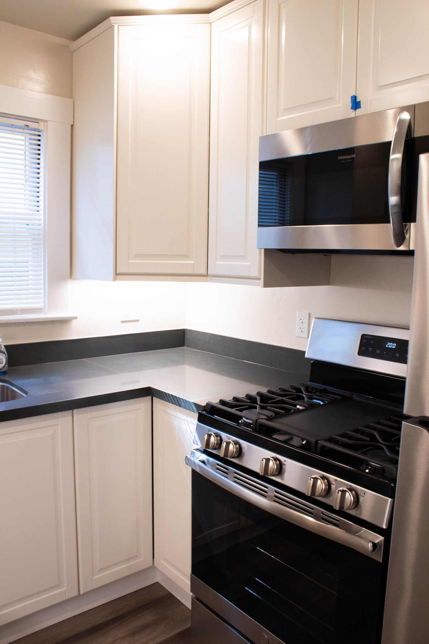 Kitchen: gas range and microwave - 2522 Capitol Ave