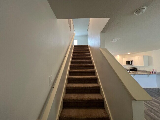 Building Photo - 4-Bedroom Home with Primary Suite | Intern...