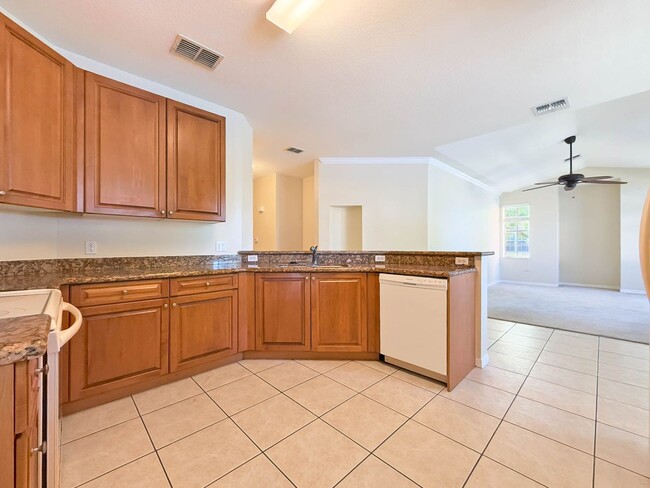 Building Photo - Beautiful 3-Bedroom Condo with 2-Car Garag...