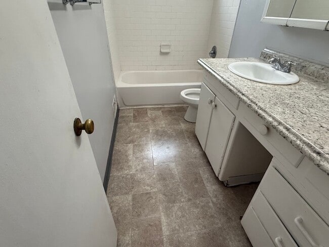 Building Photo - BRICK HOME WITH FINISHED BASEMENT