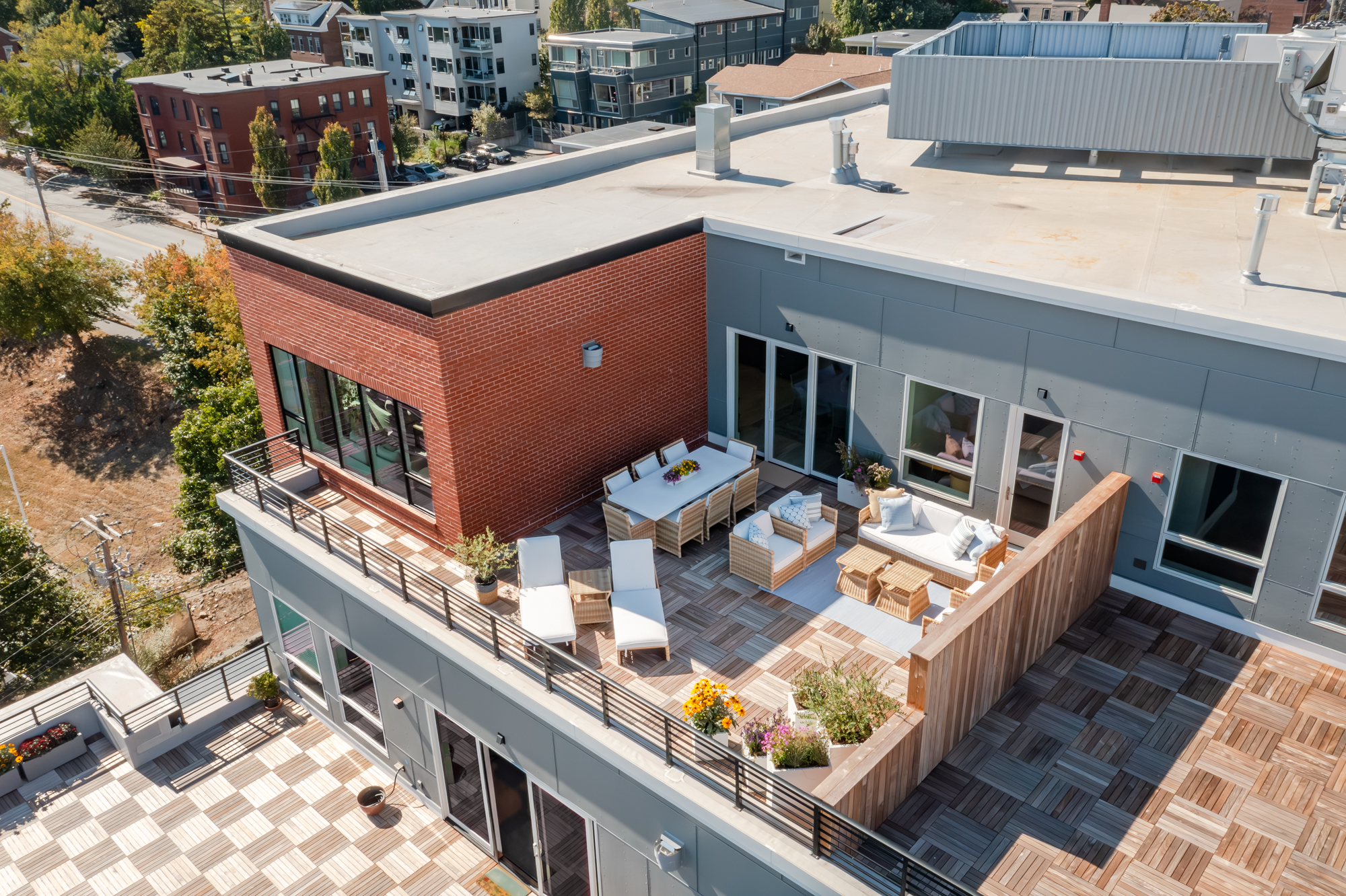 Top Corner rooftop deck with completely unobstructed views of Portland's working waterfront. - 387 Commercial St