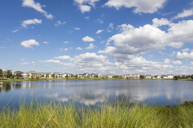 Building Photo - Lake Nona Move-In Special! Save $100/Month | 4 Bed, 3.5 Bath Laureate Park Townhome
