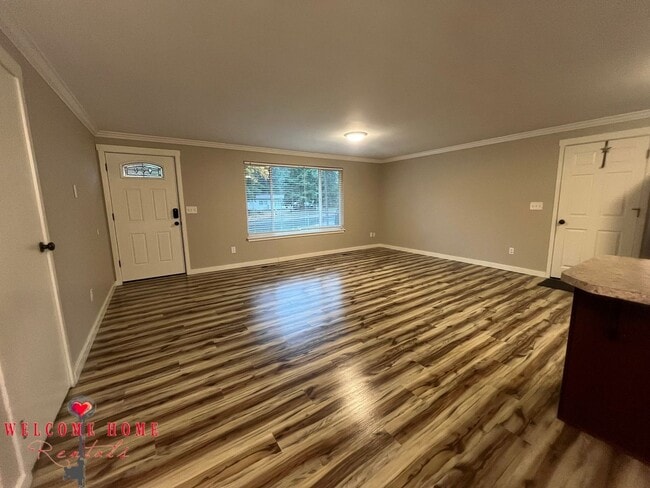 Building Photo - Remodeled rambler, no carpet, with HUGE fenced yard!!