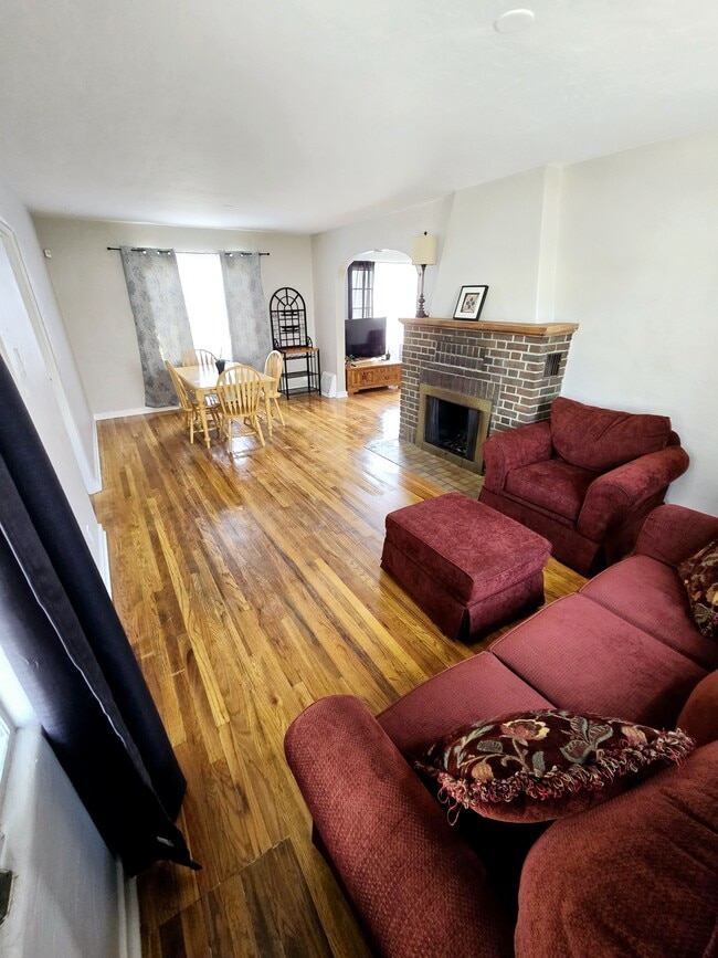 Living room with comfortable seating - 205 Harvard Dr SE