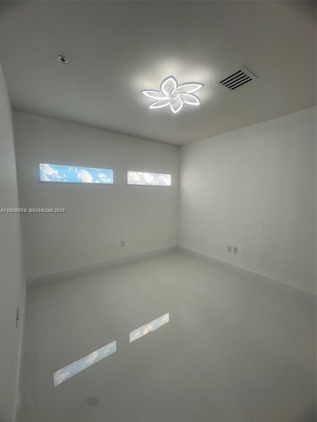 Building Photo - 7901 Hispanola Ave
