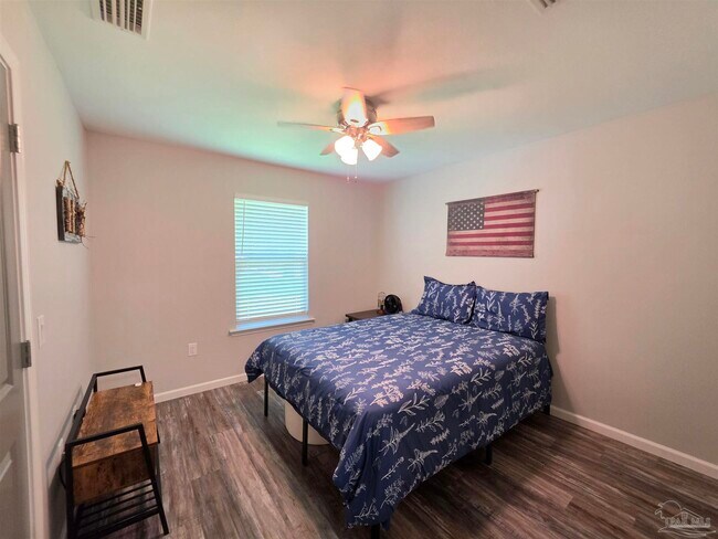 Building Photo - 5565 Riviera Dr