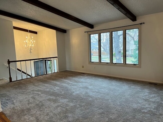 Building Photo - Vaulted Ceilings, Mountain Views & 3-Car Garage – Prime Fort Collins Rental