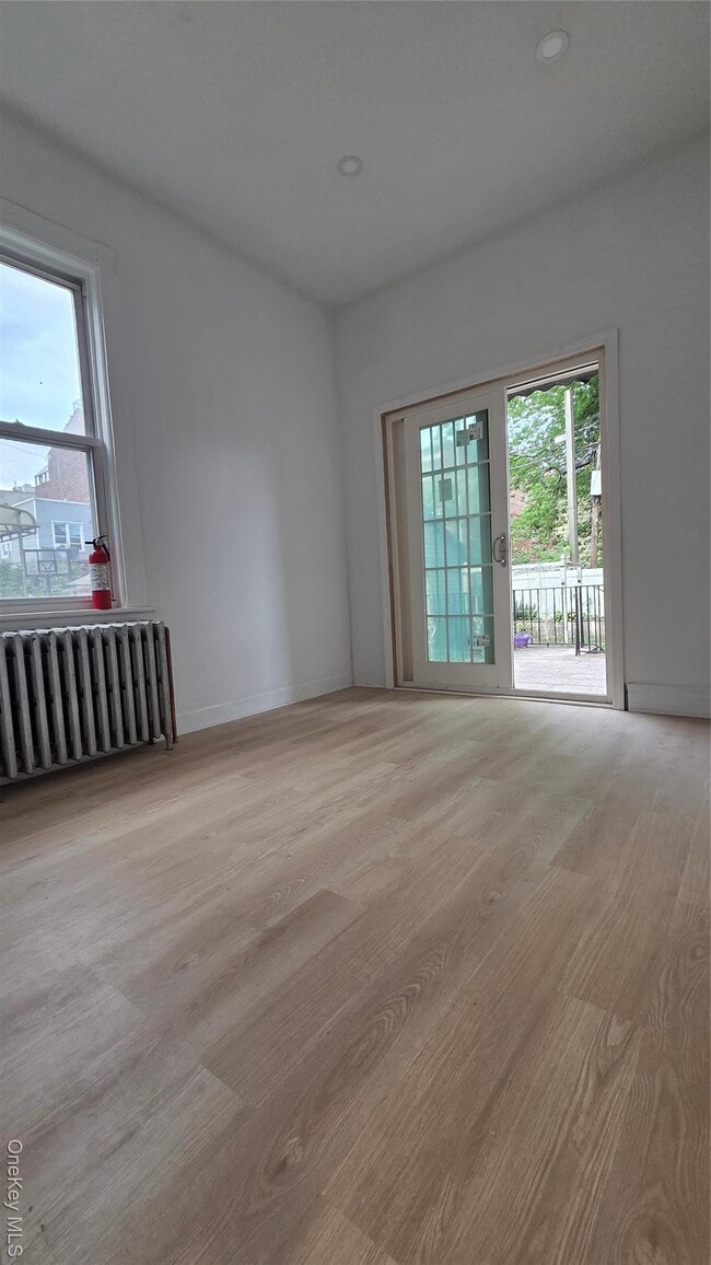 Building Photo - 42-21 65th Pl