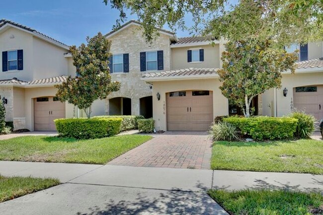 Building Photo - Elegant 2/2.5 Townhome in Guard-Gated Eagl...