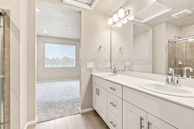 Building Photo - 12231 W 57th Dr