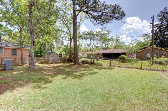 Building Photo - Renovated Three Bedroom House with large yard