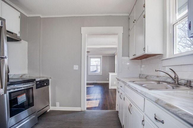 Building Photo - COMING SOON: Charming Bungalow with Spacious Living & with Modern Finishes!