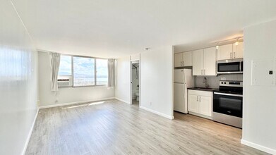 Building Photo - RENOVATED, PENTHOUSE VIEWS - Studio Unit i...