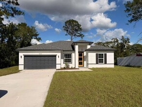 Building Photo - Charming 4-Bedroom Ocala Retreat with Spac...