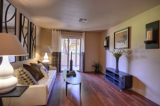 Living Room with Patio - Arborelle Apartments