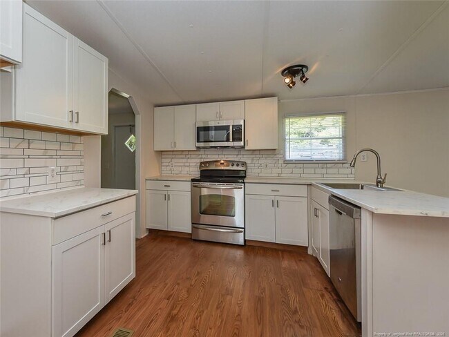 Building Photo - 6124 Heath Hawkins Ct