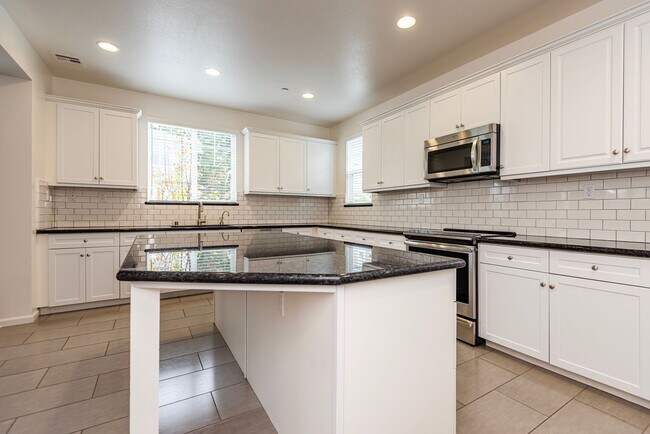 Building Photo - Modern 4BR Townhome w/ Solar, Tesla Powerwalls & 2-Car Garage