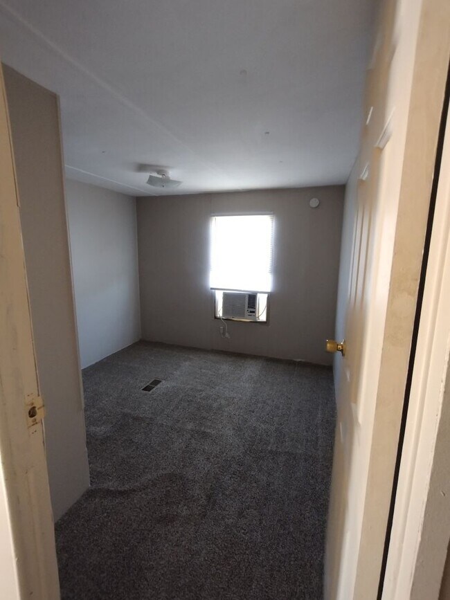 Building Photo - 3 Bedroom/2 Bath home on large fenced lot