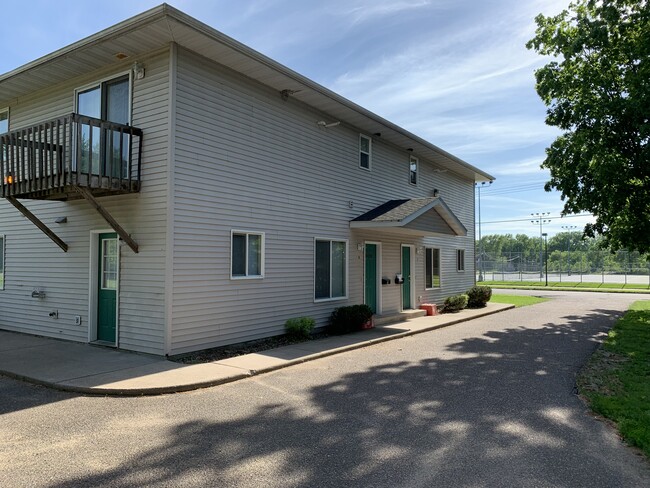 2-level townhome built for student living. Off-street paved parking. - 1716 5th St E