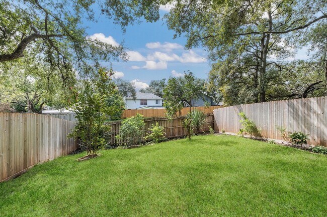 Building Photo - Modern Elegance: 3-Bedroom Townhome with Wood Flooring, Shaded Deck, and Inclusive Amenities