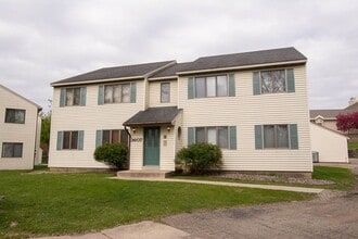 Building Photo - Upstairs condo with garage space in great NW location!