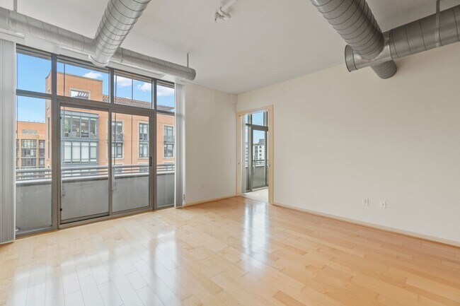 Building Photo - Madrigal Lofts in Mt Vernon Triangle | 2 Bed | 2 Bath | 920 Sf | Balcony | 1 Garage Parking Space