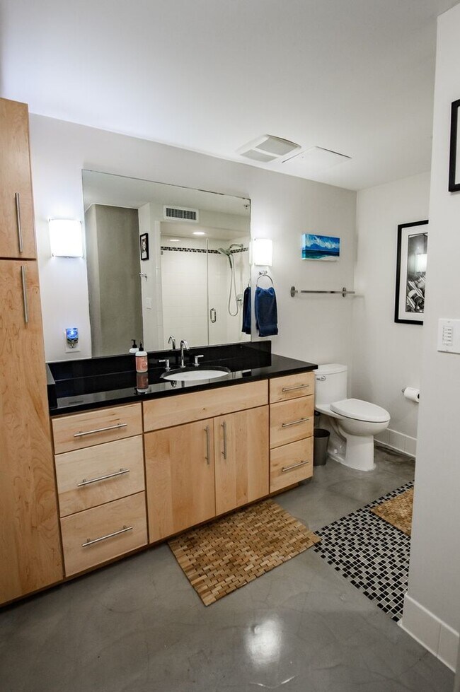 Building Photo - Authentically Cool Downtown Austin Condo | Walk Everywhere | Fully Furnished