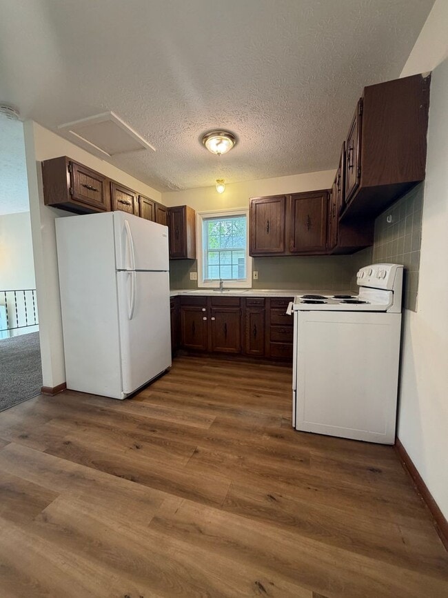 Building Photo - One Bedroom Duplex