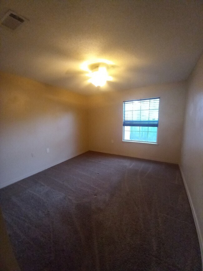 Building Photo - Cute patio home convenient to shopping and much more!