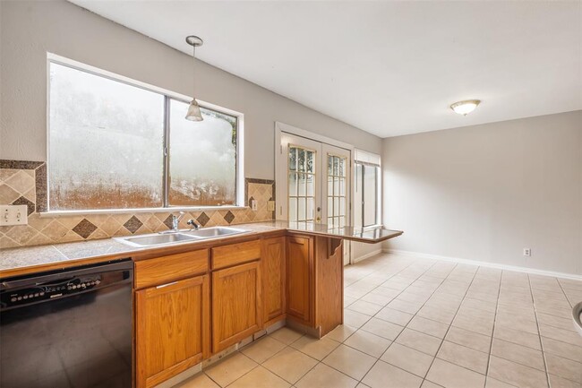 Building Photo - 9520 Quail Village Ln