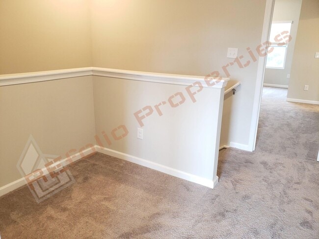 Building Photo - Beautiful Luxury 3 Story 3 Bedroom Townhome with 1st Floor Guest Suite, Attached 2 Car Garage, Co...