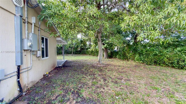 Building Photo - 1125 NW 16th Ct