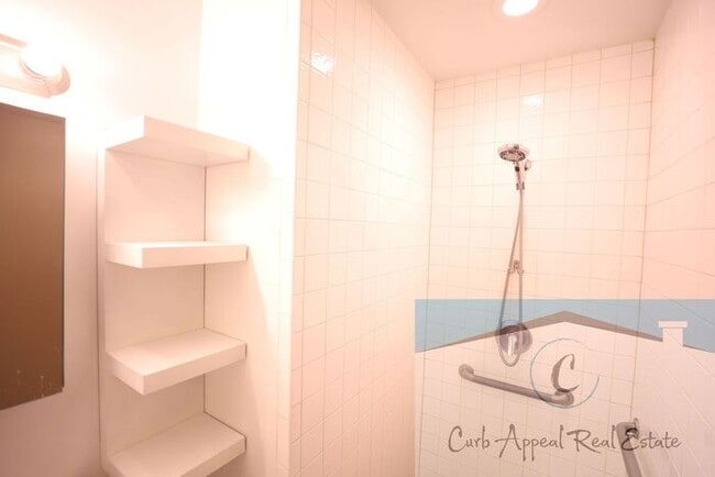 Building Photo - First month move in special $900!! Beautiful 3-bed, 2 bath condo with 2-car garage - includes was...