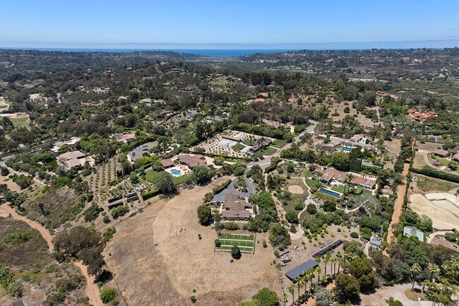 Building Photo - This Beautiful Hacienda Style Home combine...